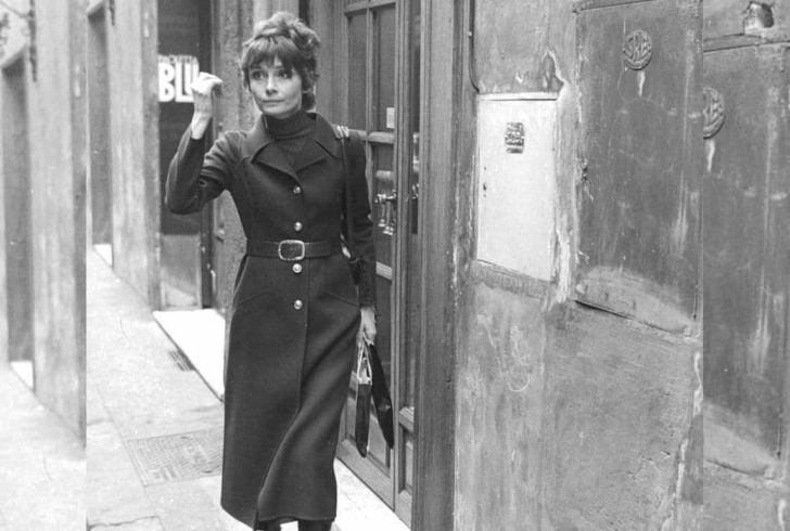 Audrey Hepburn fashion trends: She exuding timeless elegance while wearing a statement coat.