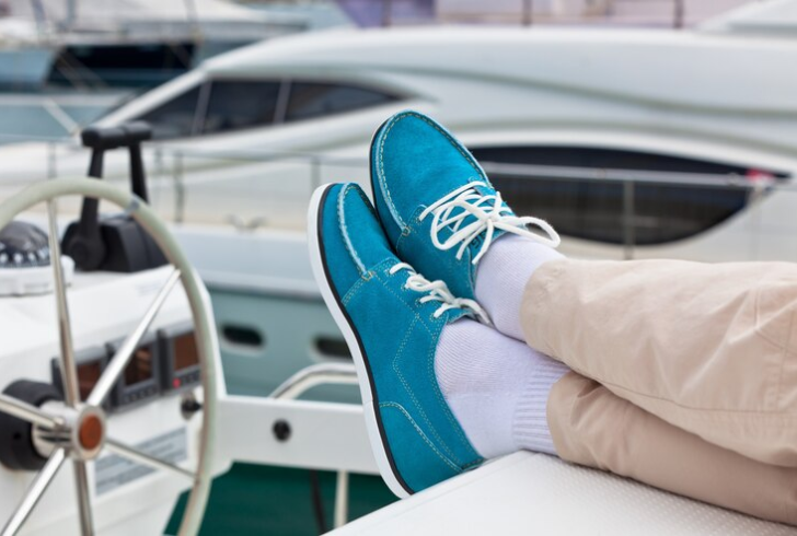 Man wearing blue sneaker on cruise