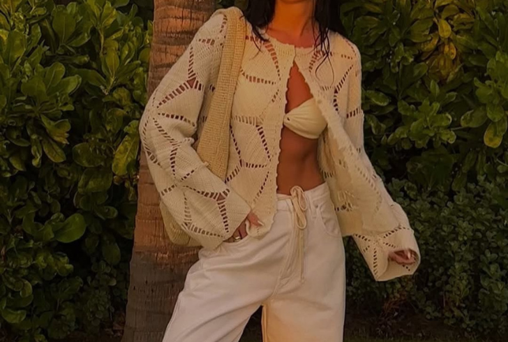 Women wearing lightweight open knit sweater style